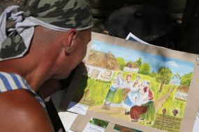 Paratrooper looks at picture