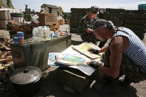 Paratrooper looks at picture