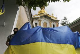 Activists with the flag of Ukraine
