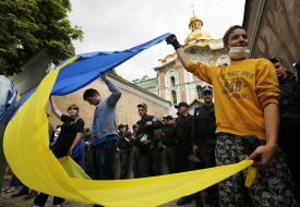 Activists with the flag of Ukraine