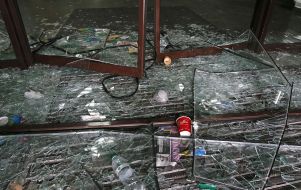Broken glass door of the hotel