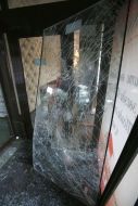 Broken glass door of the hotel