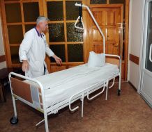 Doctor shows a new bed
