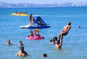 Holidaymakers on the beach