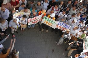 Participant holds a placard picket