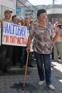 Participant holds a placard picket