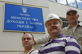 Participant holds a placard picket