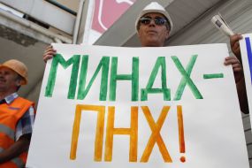 Participant holds a placard picket