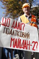 Participant holds a placard picket
