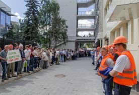 Participant holds a placard picket
