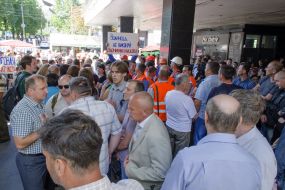 Participant holds a placard picket