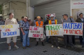 Participant holds a placard picket