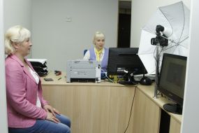 People at the center of "Passport Services"