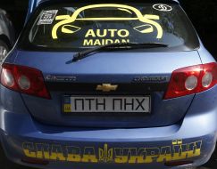 Car with license plate "PTN PNH"