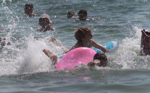 Participants of swim on mattresses