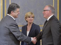 Petr Poroshenko,  Franciscus Timmermans and Julie Bishop