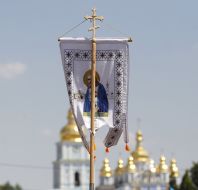 Holy banner on the background of the Mikhailovsky Cathedral