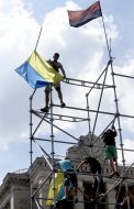 Activists set shield on stage on Maidan Nezalezhnosti