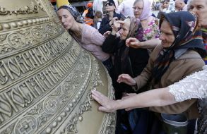 Believers are applied to the Lavra cathedral Bell All Saints