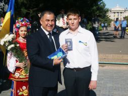 Yuri Granaturov presenting passport