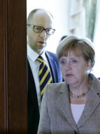Arseniy Yatsenyuk and Angela Merkel