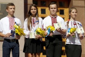 Young people holding passports