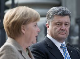 Petr Poroshenko and Angela Merkel