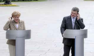 Petr Poroshenko and Angela Merkel