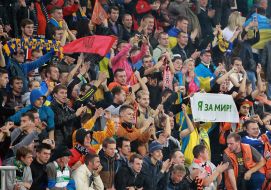 Fans in the stands of the stadium