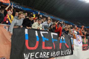 Fans in the stands of the stadium