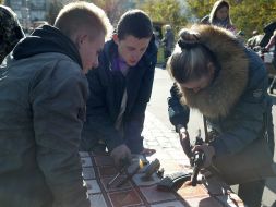 Girl gathers Kalashnikov rifle