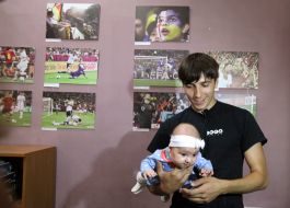 Viktor Gurnyak with his child