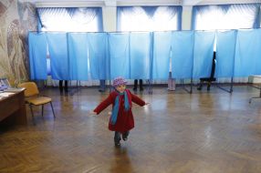 A child at a polling station