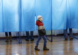 A child at a polling station