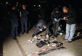 Militiamen inspect the seized things