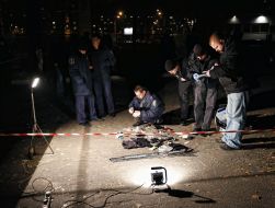 Militiamen inspect the seized things