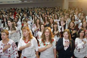 Students sing the anthem