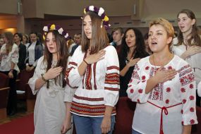 Students sing the anthem