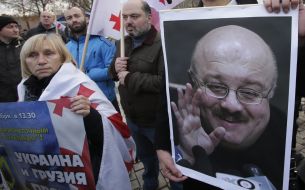 Учасники акції проти окупаційної політики РФ на підтримку Грузії