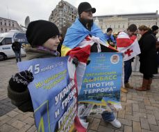 Учасники акції проти окупаційної політики РФ на підтримку Грузії