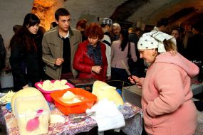 Customers buy cheese 