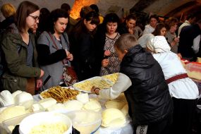 Customers buy cheese