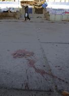 Blood on the sidewalk in the Schaste city