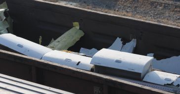 Train with the debris of the Boeing Malaysian