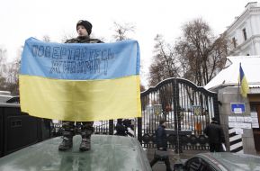 Boy holding a flag of Ukraine
