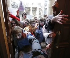 Activists in zombies costumes