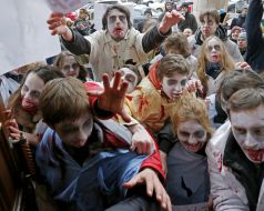 Activists in zombies costumes