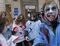 Activists in zombies costumes