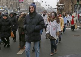 Activists in zombies costumes