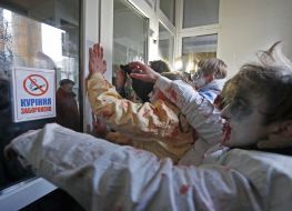 Activists in zombies costumes